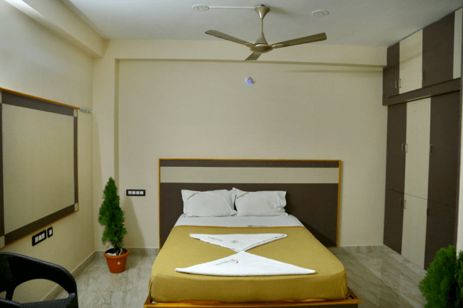 Vashundharas Hotel - Double Bed Room